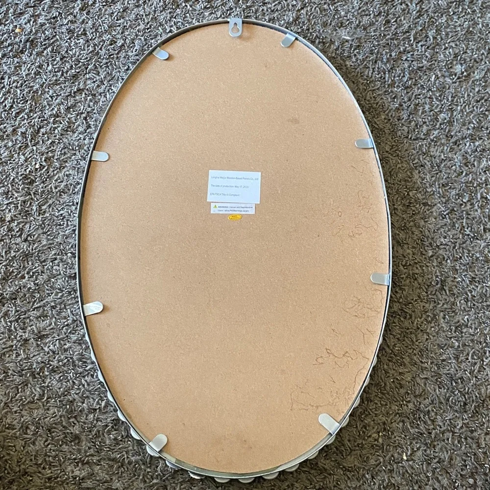 Elegant Oval Crystal-Trimmed Wall Mirror